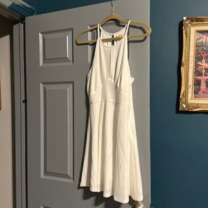White, lined, strappy dress with keyhole neckline